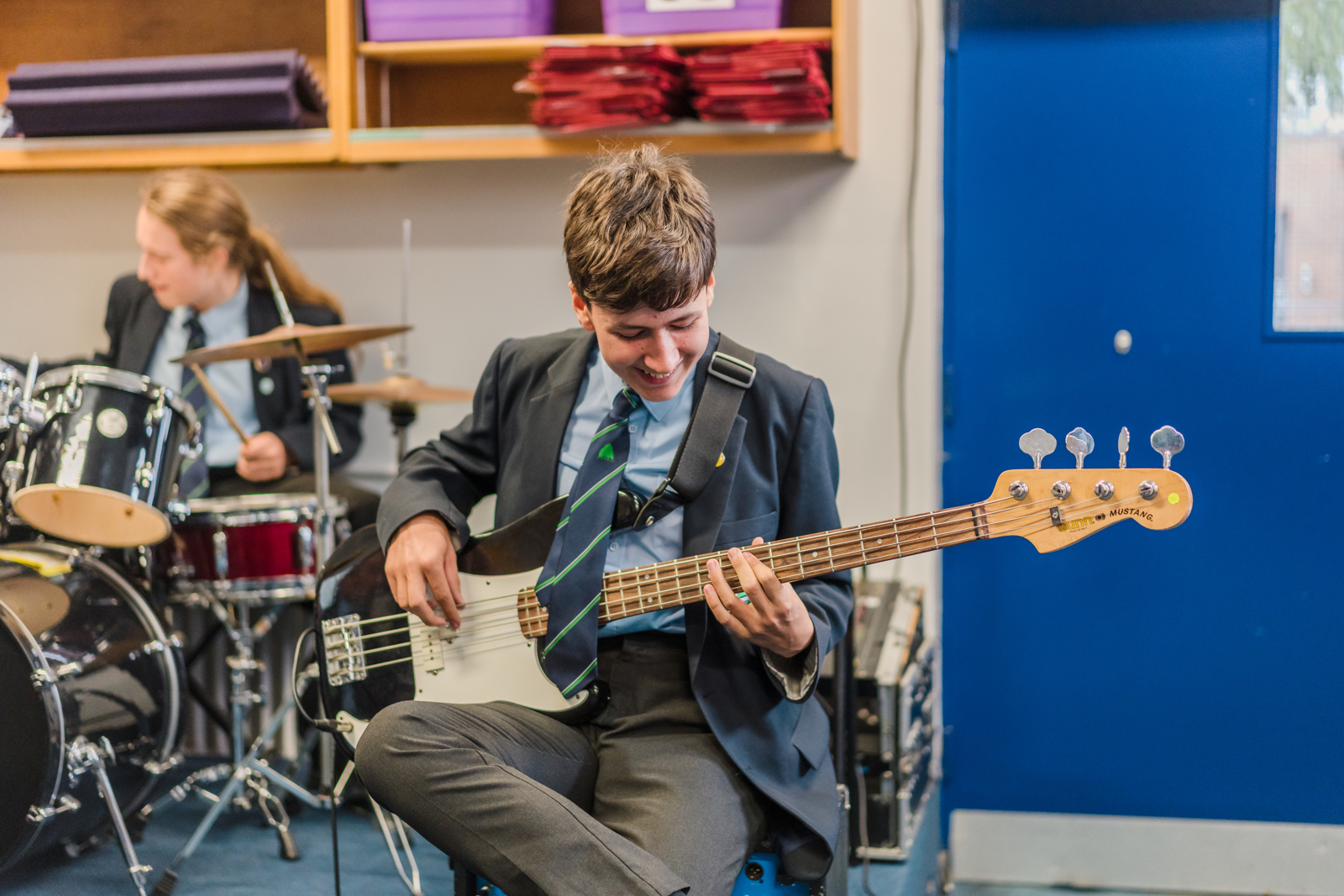 Student Playing the Guitar